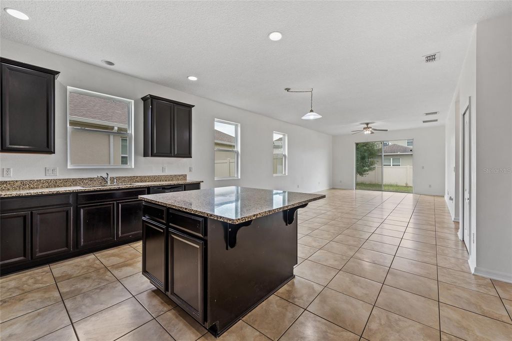 Image 7 of property listing at 12315 SAWGRASS PRAIRIE LOOP, Orlando, FL 32824
