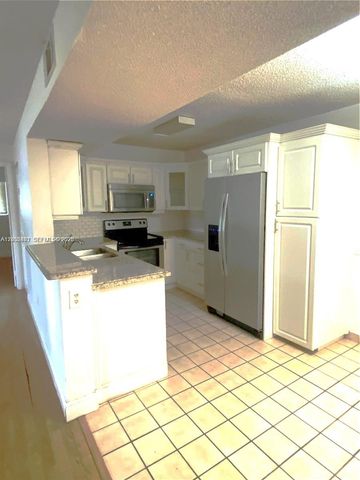 300 W Palm Cir W 208, Pembroke Pines, FL 33025