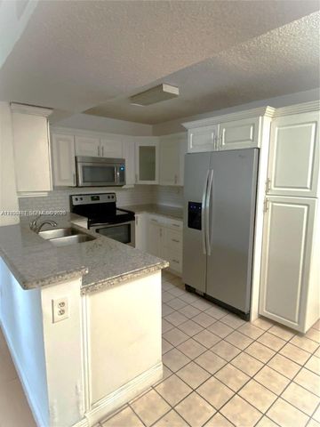 300 W Palm Cir W 208, Pembroke Pines, FL 33025