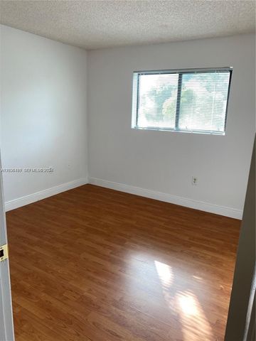 300 W Palm Cir W 208, Pembroke Pines, FL 33025
