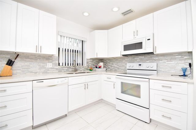 3305 Silver Buttonwood Drive, Greenacres, FL 33463