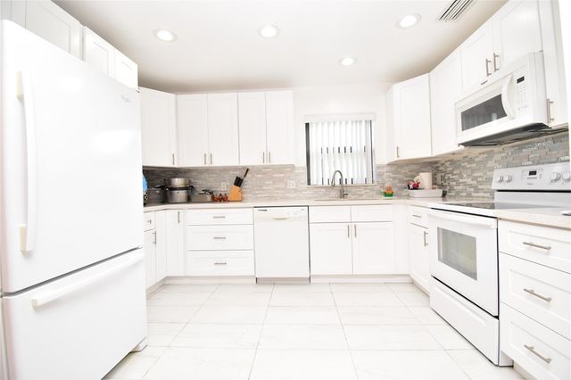 3305 Silver Buttonwood Drive, Greenacres, FL 33463