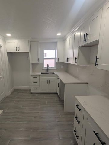 7713 Kimberly Boulevard, North Lauderdale, FL 33068