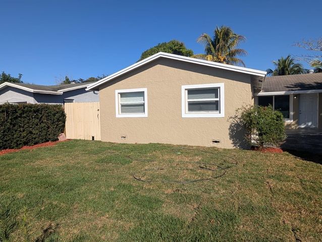 7713 Kimberly Boulevard, North Lauderdale, FL 33068