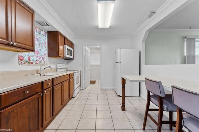 312 Grovewood AVE S, Lehigh Acres, FL 33936