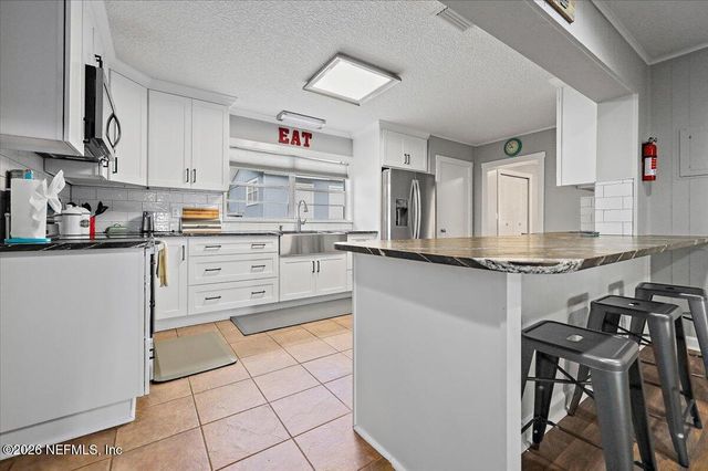 567 W HILLSBOROUGH Avenue, Florahome, FL 32140