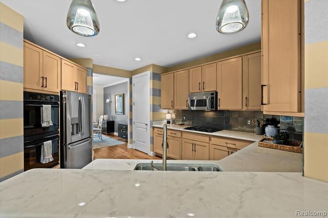 10743 Waterfall Court, South Lyon, MI 48178