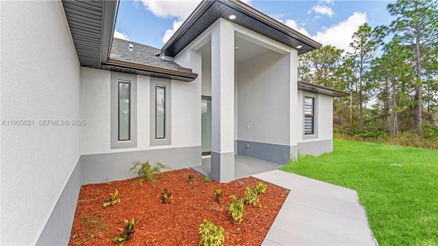 1121 CROCUS ST E, Lehigh Acres, FL 33974