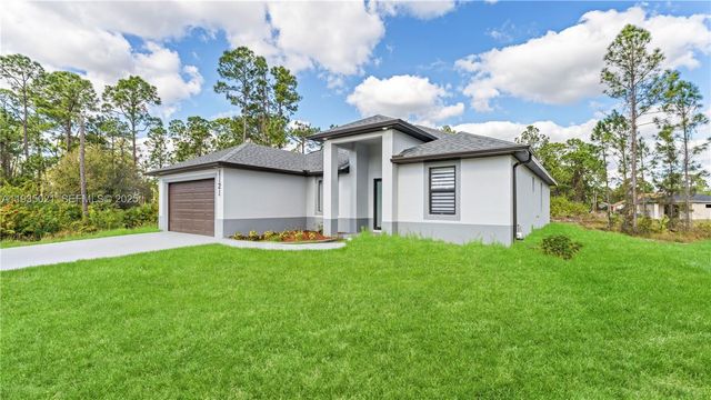 1121 CROCUS ST E, Lehigh Acres, FL 33974