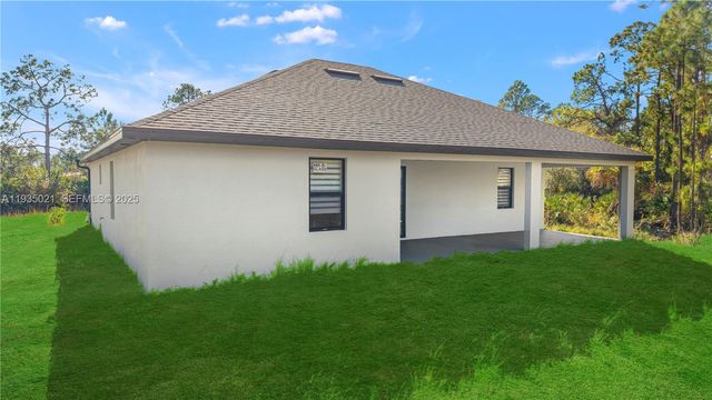1121 CROCUS ST E, Lehigh Acres, FL 33974