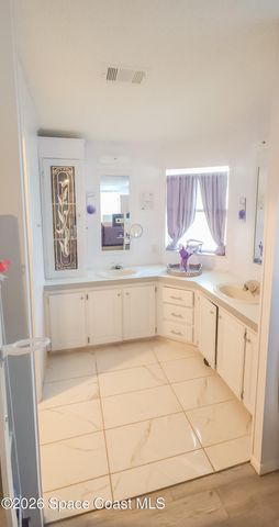 701 Gladiolus Drive, Barefoot Bay, FL 32976