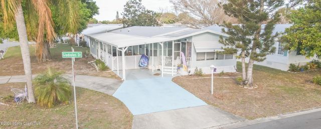 701 Gladiolus Drive, Barefoot Bay, FL 32976