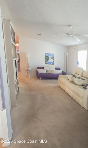 701 Gladiolus Drive, Barefoot Bay, FL 32976