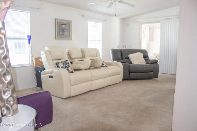 701 Gladiolus Drive, Barefoot Bay, FL 32976