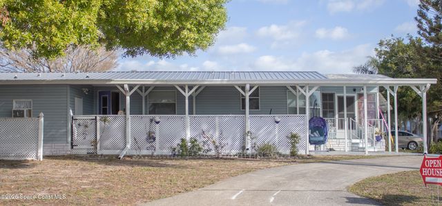 701 Gladiolus Drive, Barefoot Bay, FL 32976