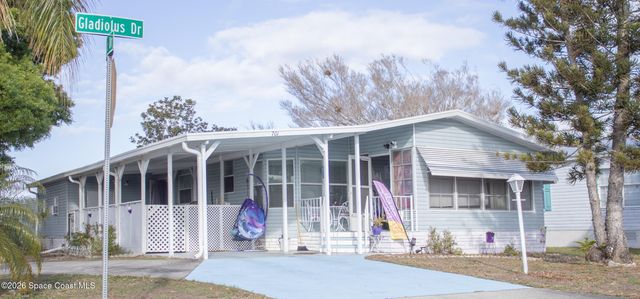 701 Gladiolus Drive, Barefoot Bay, FL 32976