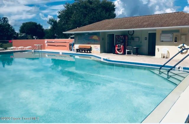 701 Gladiolus Drive, Barefoot Bay, FL 32976