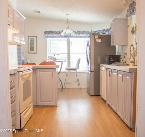 701 Gladiolus Drive, Barefoot Bay, FL 32976