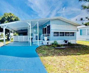 701 Gladiolus Drive, Barefoot Bay, FL 32976