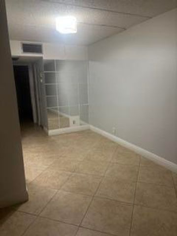 600 VILLAGE GREEN Court 220, Palm Springs, FL 33461