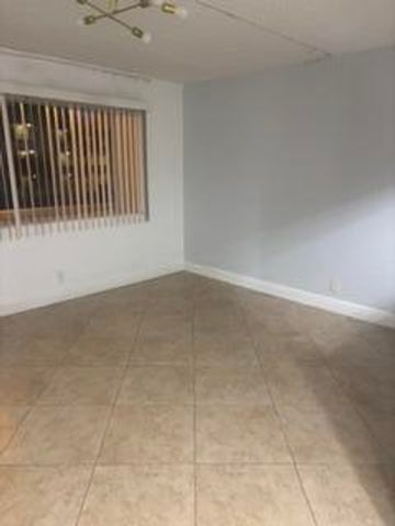 600 VILLAGE GREEN Court 220, Palm Springs, FL 33461