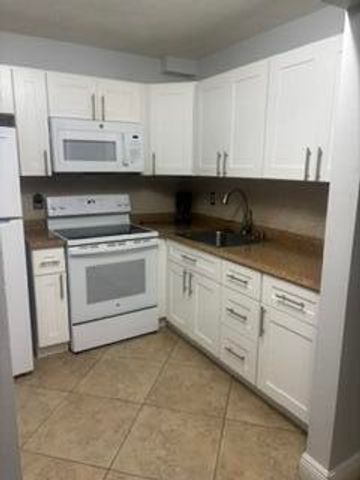 600 VILLAGE GREEN Court 220, Palm Springs, FL 33461