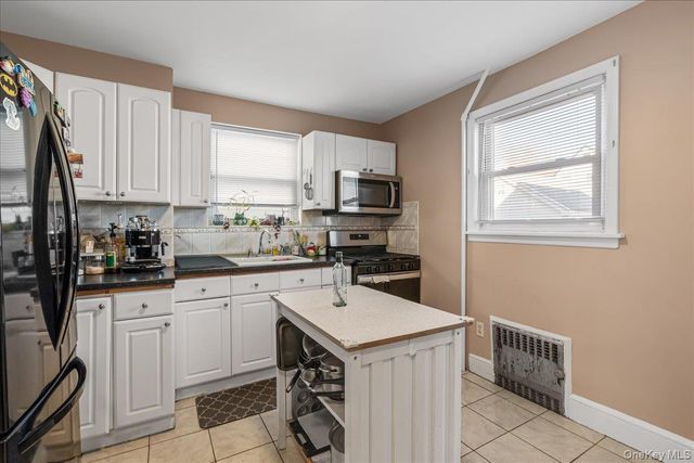 89-13 213th Street, Queens Village, NY 11427