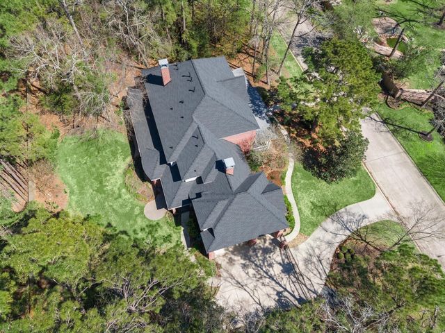 1506 Sheltering Oaks Lane, Kingwood, TX 77345