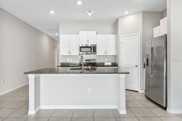 5406 AMARYLLIS GARDEN STREET, Apollo Beach, FL 33572