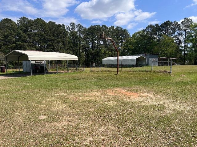 225 CR 2091, Carthage, TX 75633