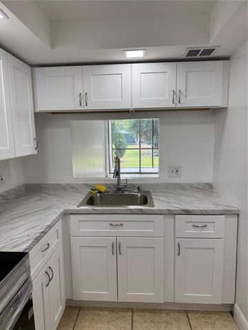 115 ROYAL PARK Drive 1F, Oakland Park, FL 33309