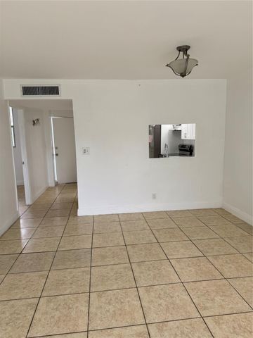 115 ROYAL PARK Drive 1F, Oakland Park, FL 33309