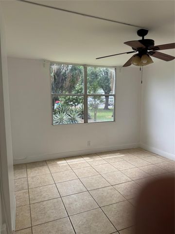 115 ROYAL PARK Drive 1F, Oakland Park, FL 33309