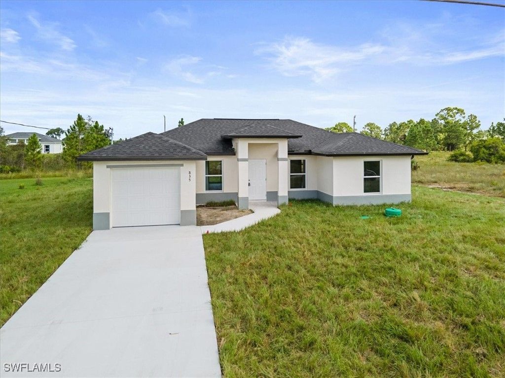 663 Hawthorne AVE S, Lehigh Acres, FL 33974