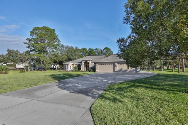 11235 WARM WIND WAY, Weeki Wachee, FL 34613