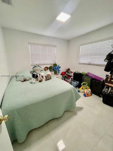 10891 N Snapper Creek Drive, Miami, FL 33173