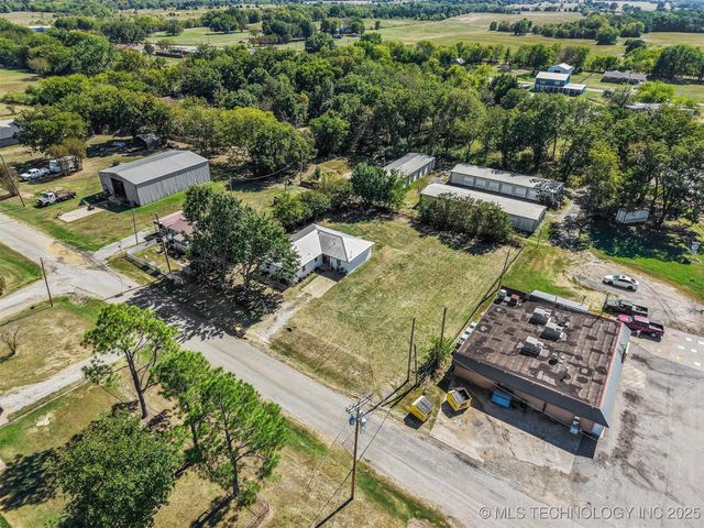 110 E Main, Achille, OK 74720