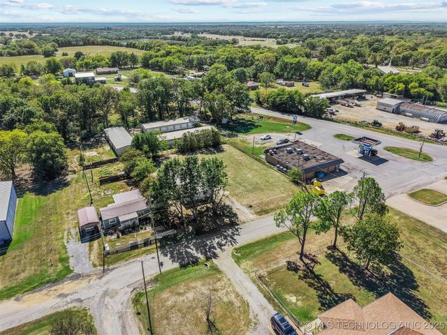 110 E Main, Achille, OK 74720