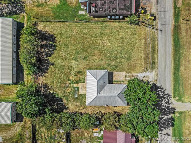 110 E Main, Achille, OK 74720