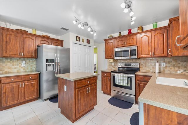 9808 LONG MEADOW DRIVE, Tampa, FL 33615