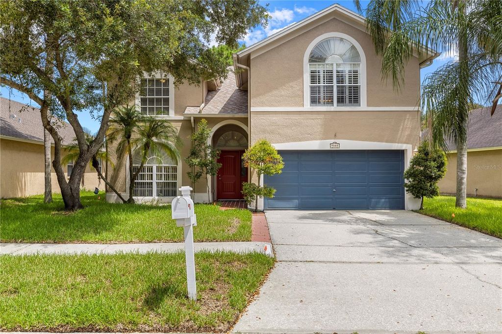 Image 2 of property listing at 9808 LONG MEADOW DRIVE, Tampa, FL 33615