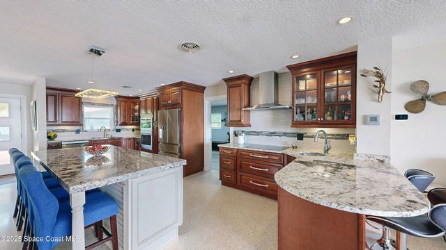 10758 S Tropical Trail, Merritt Island, FL 32952