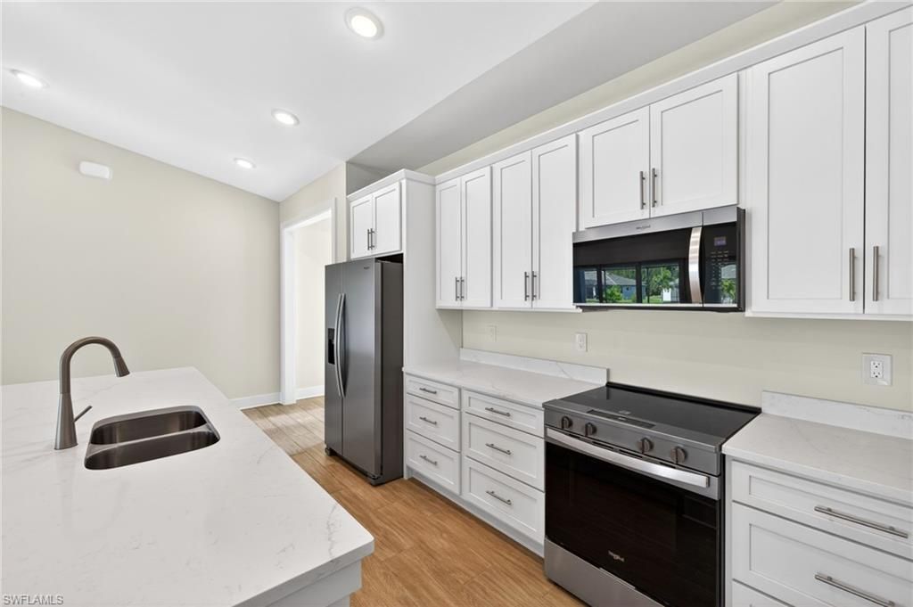 Image 6 of property listing at 1030 SW 15th AVE, Cape Coral, FL 33991
