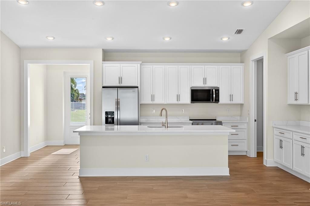 Image 7 of property listing at 1030 SW 15th AVE, Cape Coral, FL 33991