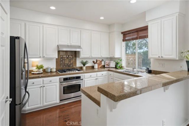 24125 Willowbrooke Court, Valencia, CA 91354