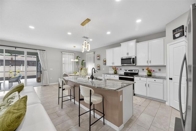 33146 SAND CREEK DRIVE, Wesley Chapel, FL 33543