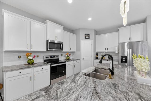 33146 SAND CREEK DRIVE, Wesley Chapel, FL 33543