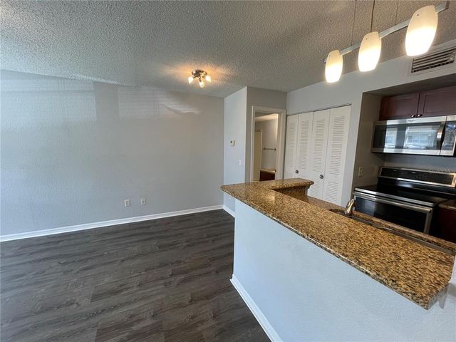 5128 CONROY ROAD 13, Orlando, FL 32811