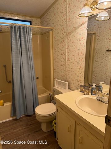 706 Hyacinth Circle, Barefoot Bay, FL 32976