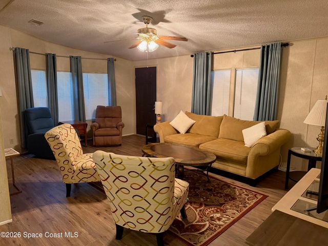 706 Hyacinth Circle, Barefoot Bay, FL 32976